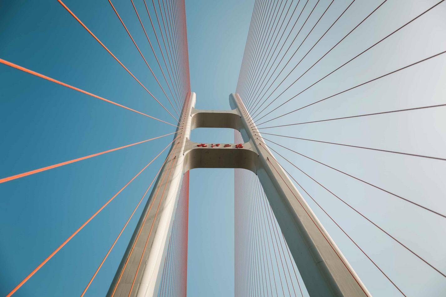 Low angle bridge with blue sky