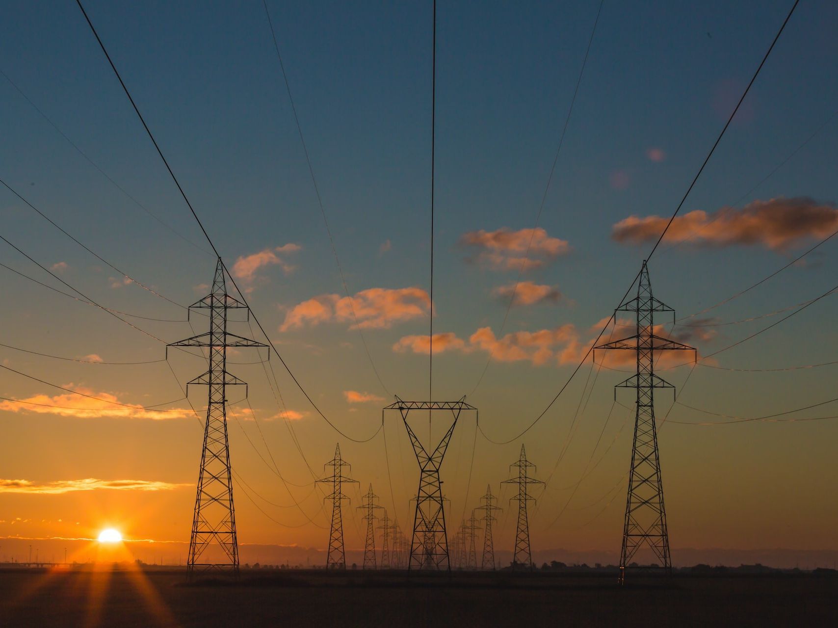 [[Translate to "English"]] Sunset with electrical line