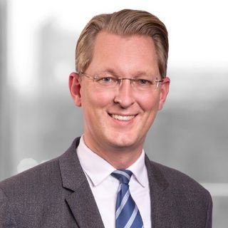Dr. Christian Teuber